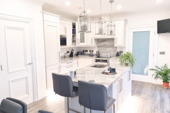  white kitchen cupboards with marble worktops in portstewart